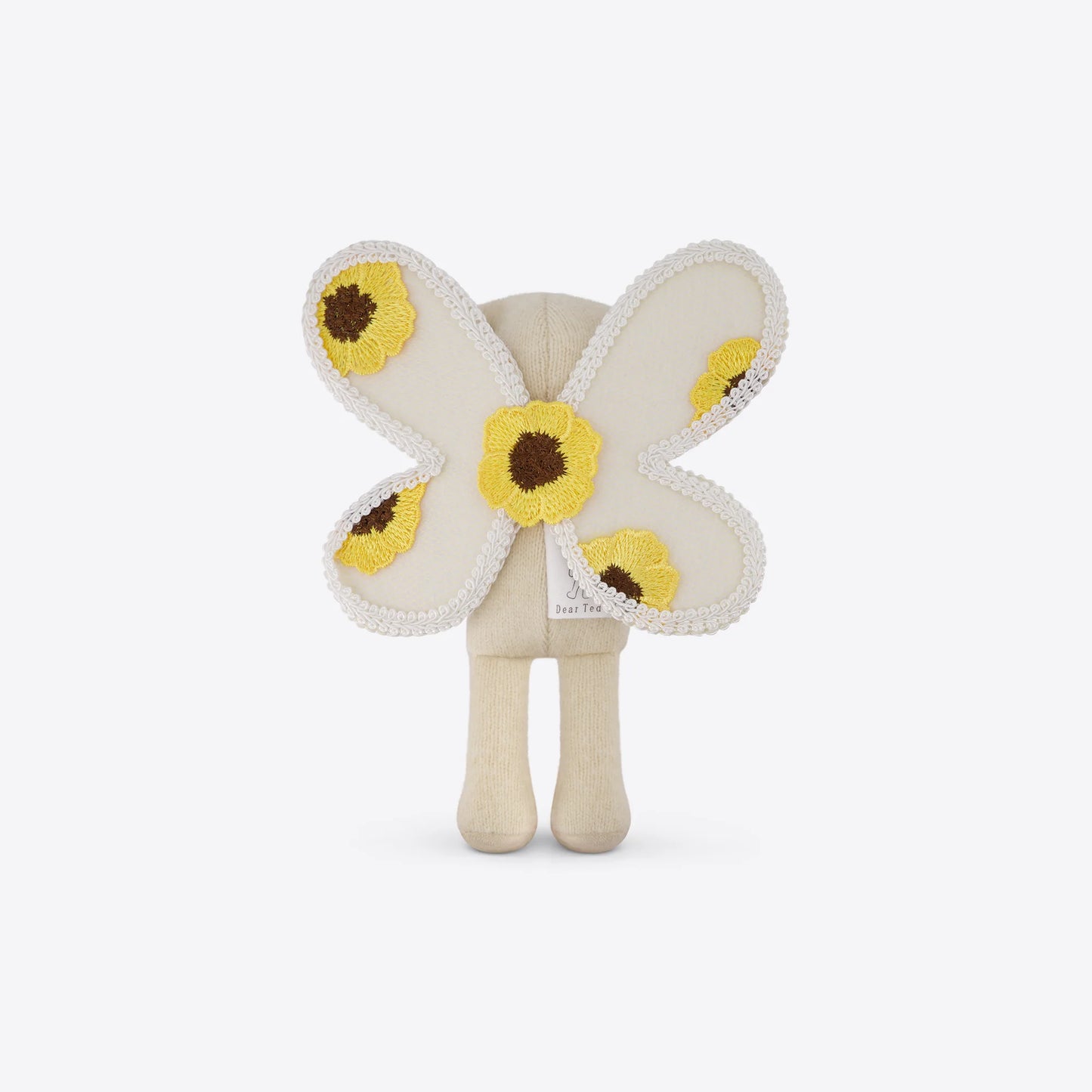 Butterfly-shaped plush toy with yellow and brown details on a white background