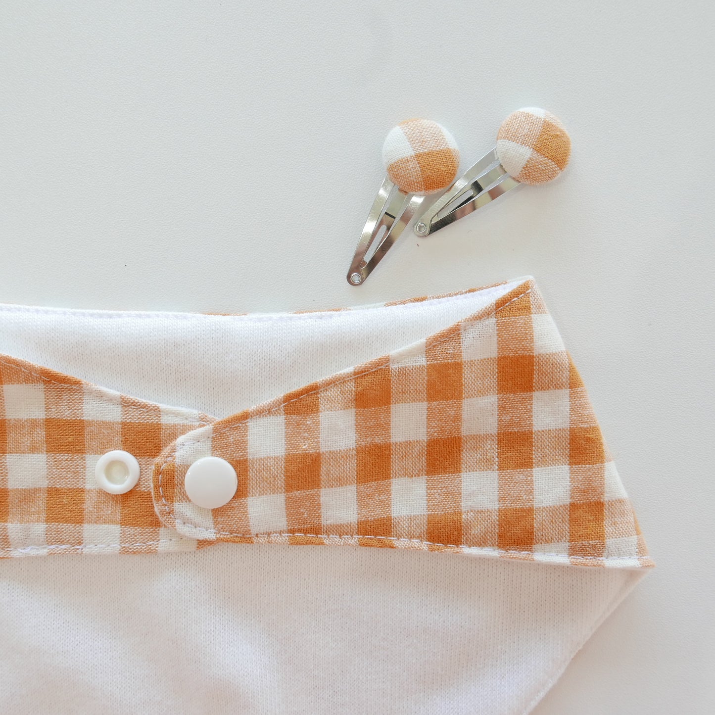 Making Good - Bib and Hair Clip Set in Orange Gingham