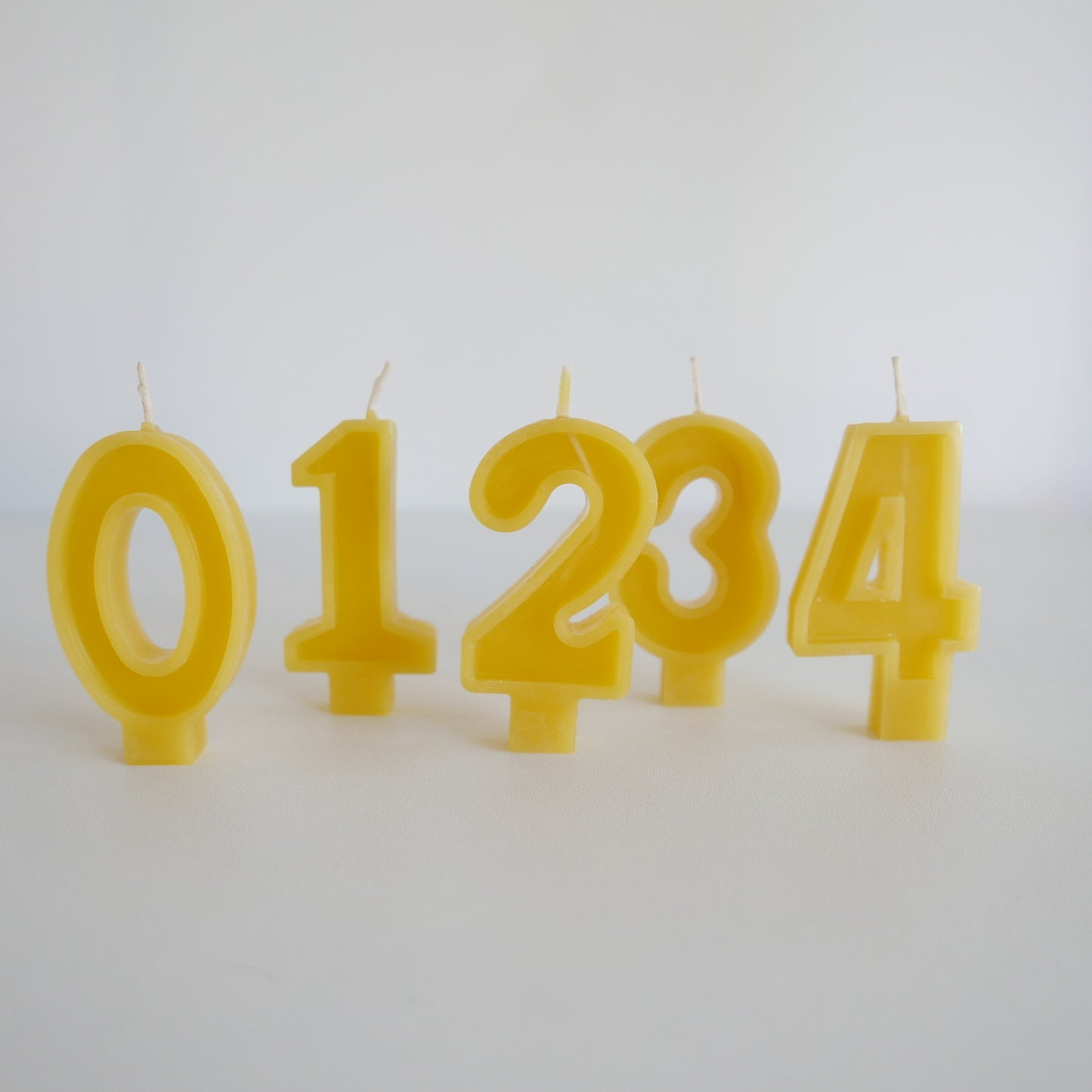 Bright beeswax number candle perfect for kids’ birthday cakes