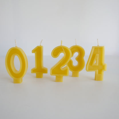 Bright beeswax number candle perfect for kids’ birthday cakes