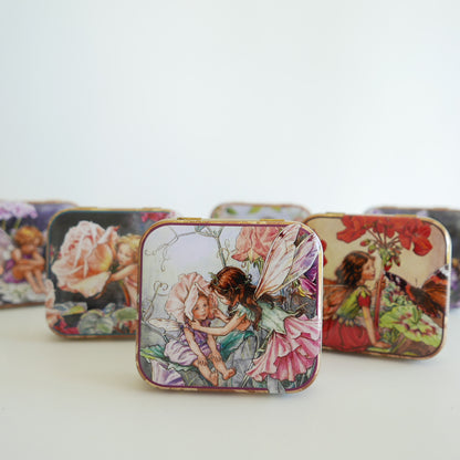 Decorative tins with fairy designs 