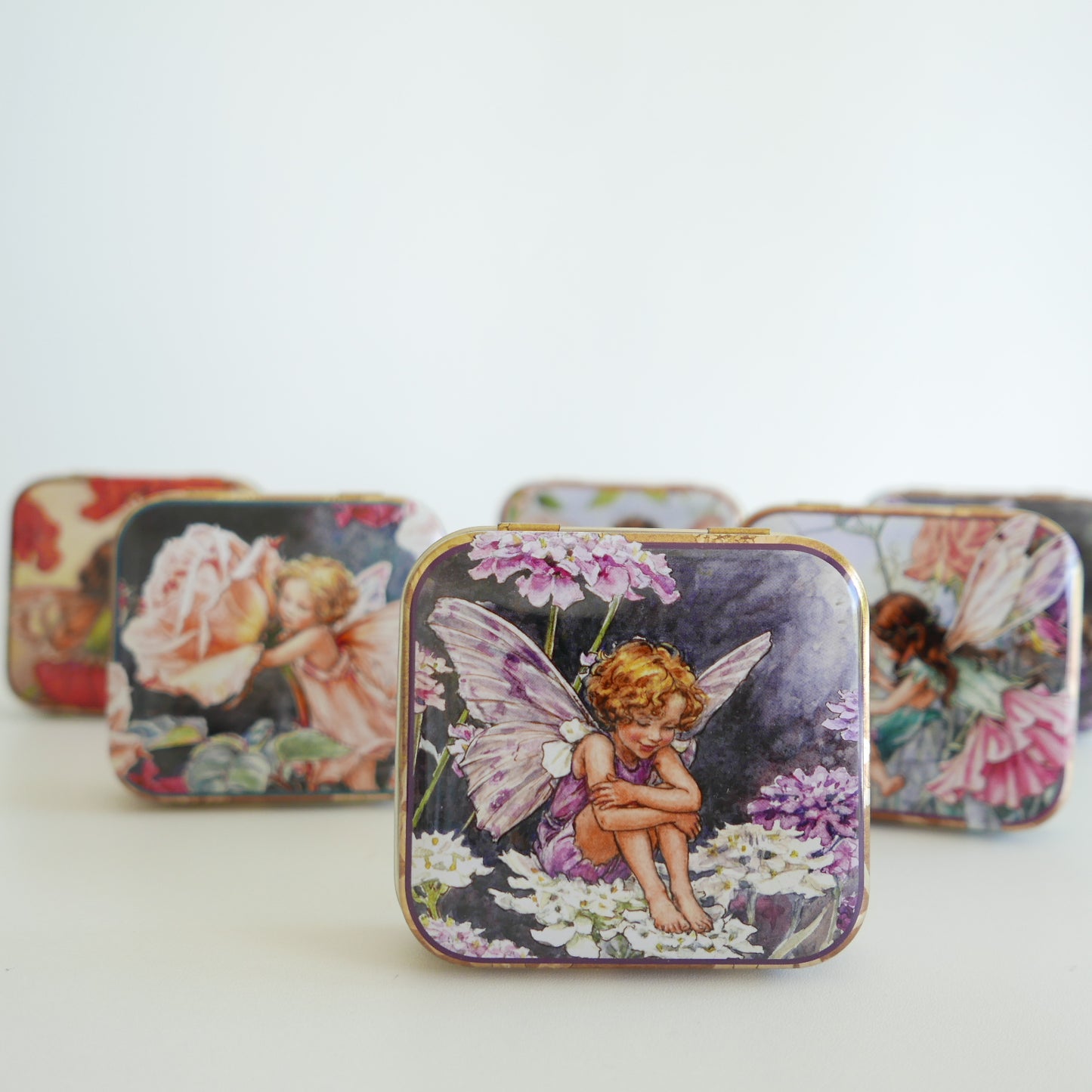 fairy tins with wings for storing