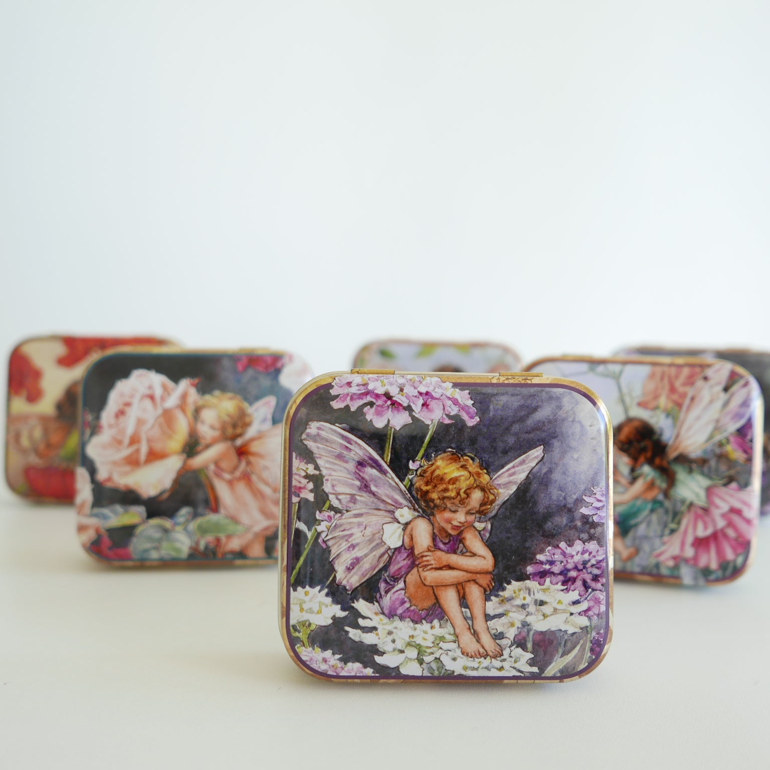 fairy tins with wings for storing