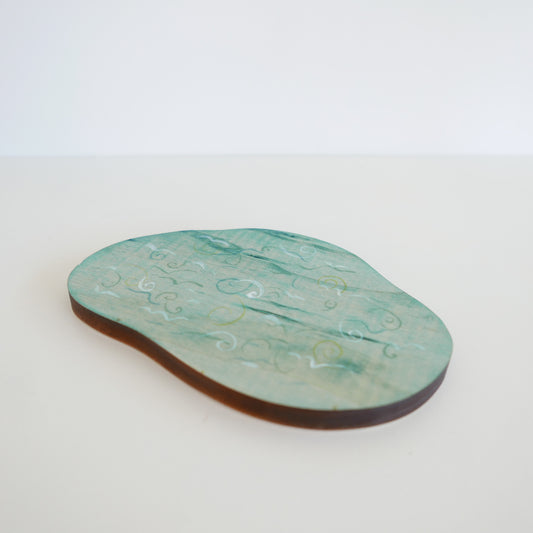 Handcrafted blue wooden lake toy with organic curved edges, designed for imaginative landscape scenes, displayed against white