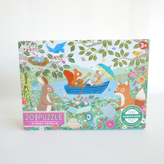 Children's puzzle box with garden animals design on a white background