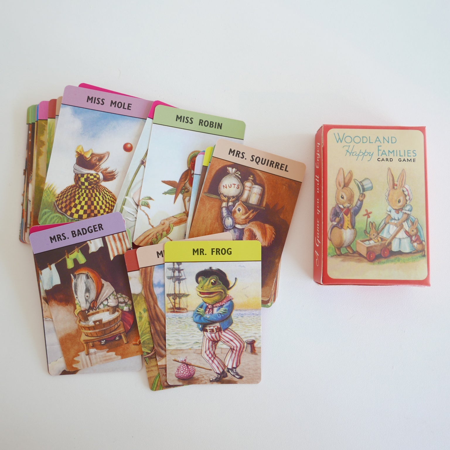 Woodland-themed card game with character cards on a white background