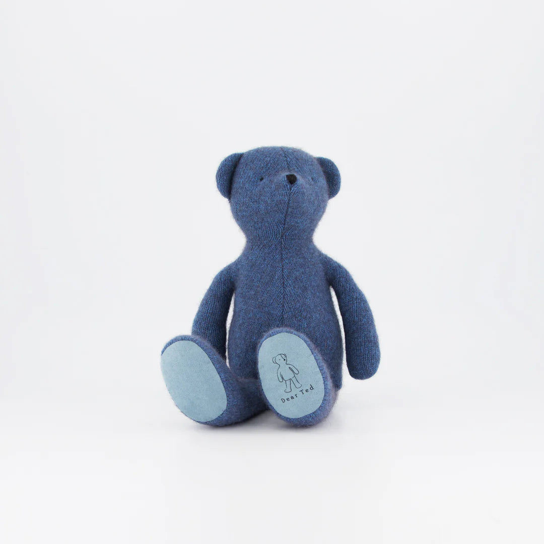 Handmade Large Ted plush bear in soft periwinkle blue, featuring stitched face and cuddly texture, photographed on a white background