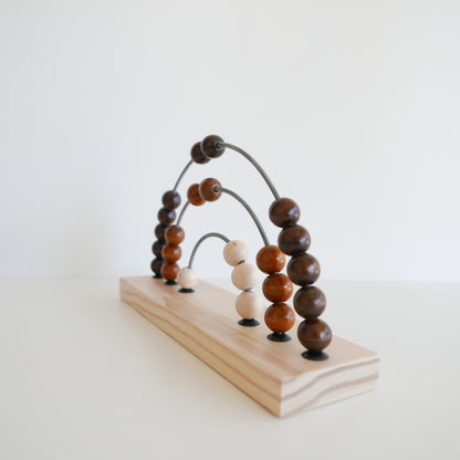 Wooden abacus with brown and beige beads 