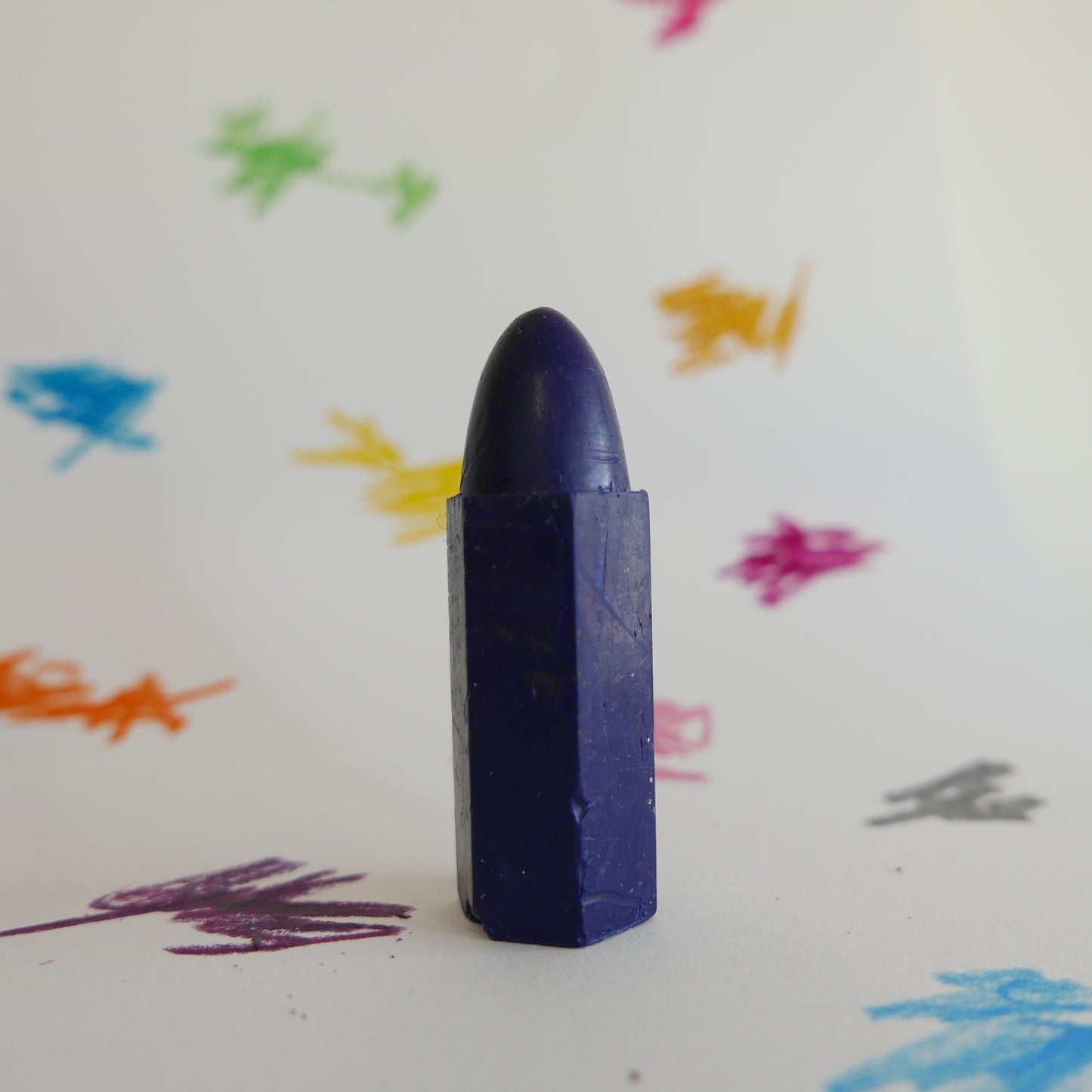 Blue Cognito crayon produced locally displayed alone
