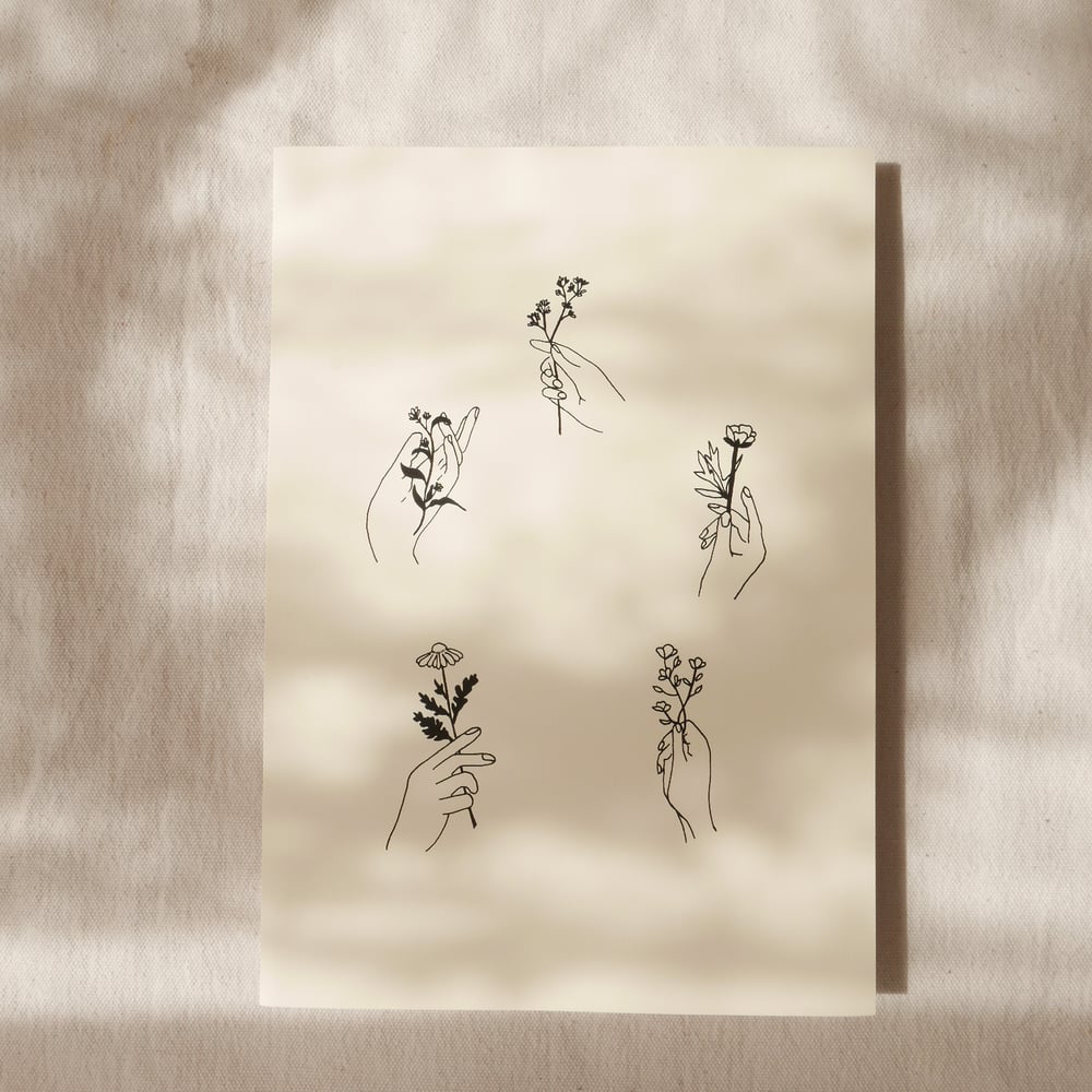 Hands Holding Flowers