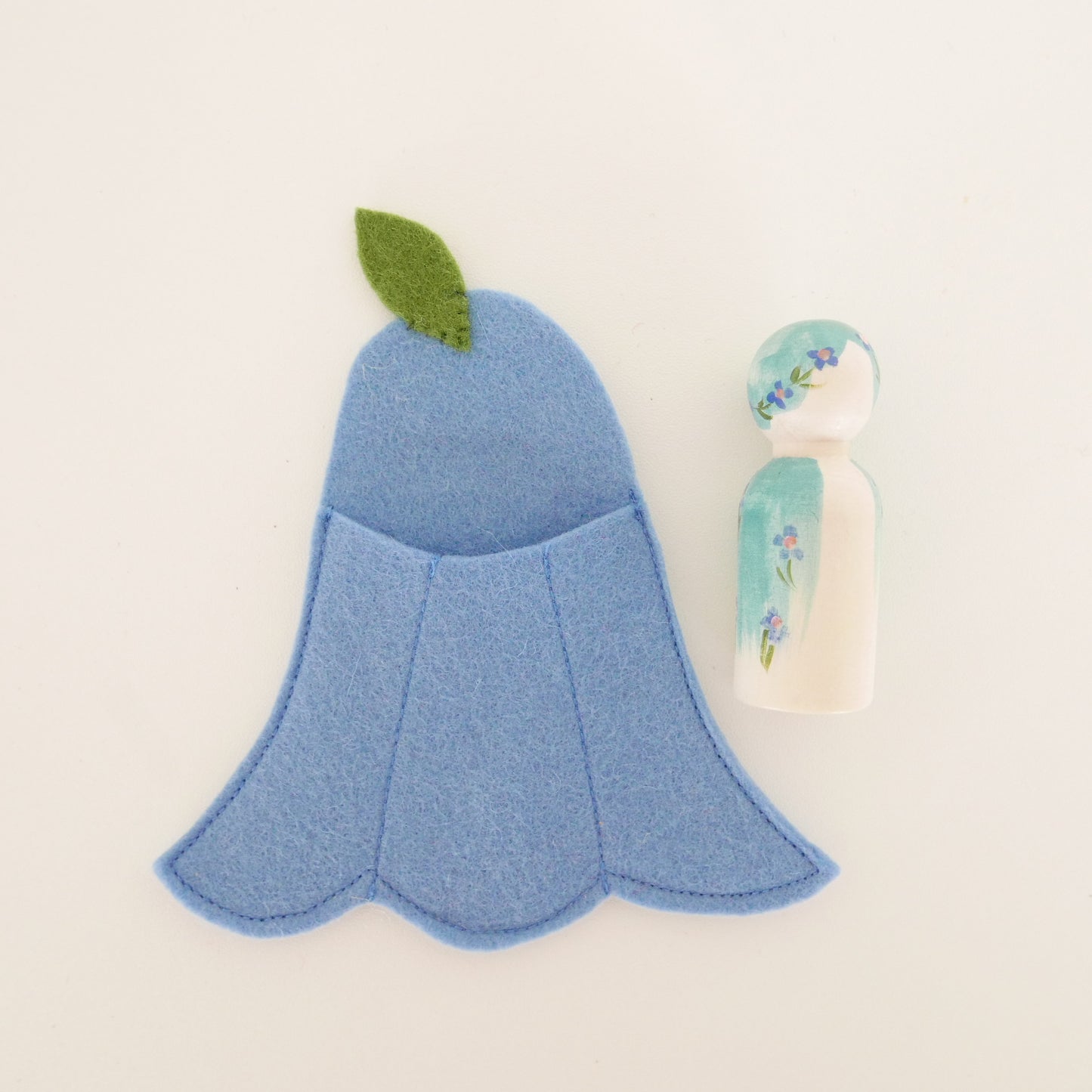 Flower Fairy in a Felt Bed