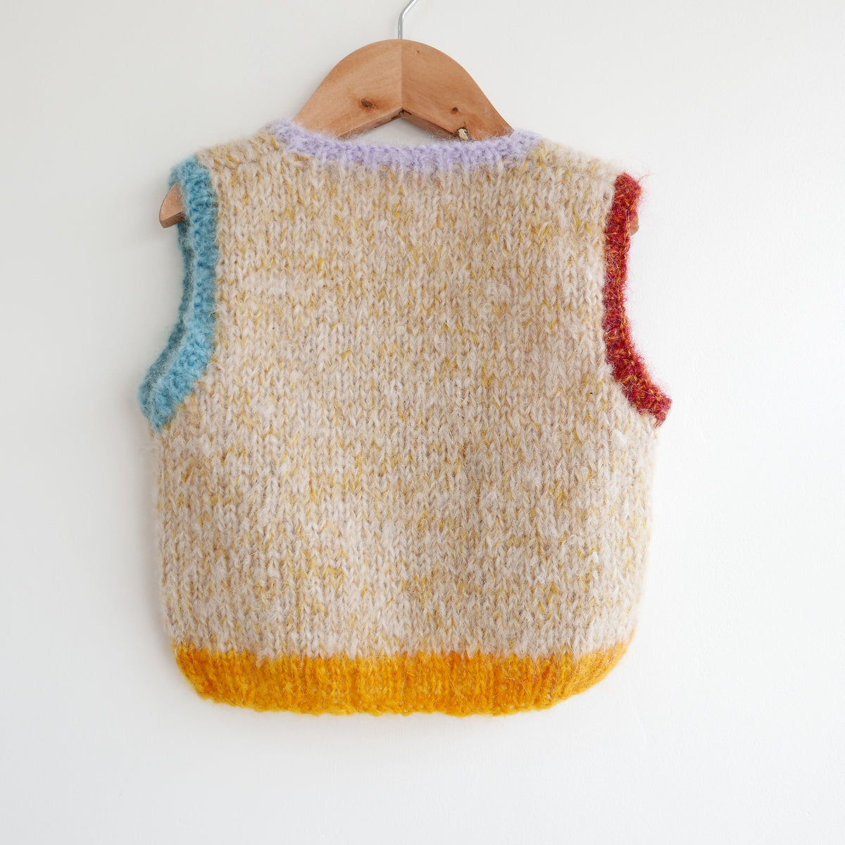 Hand knitted vest - Tangy Fruit