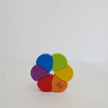 Colorful wooden toy with rainbow pattern 