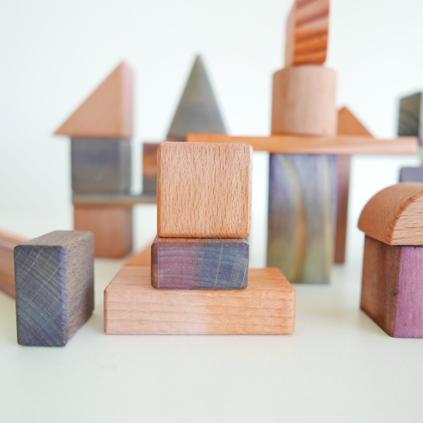 Artistic building blocks inspired by Rothko, featuring vibrant colors and simple geometric shapes, displayed on white