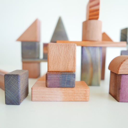 Artistic building blocks inspired by Rothko, featuring vibrant colors and simple geometric shapes, displayed on white