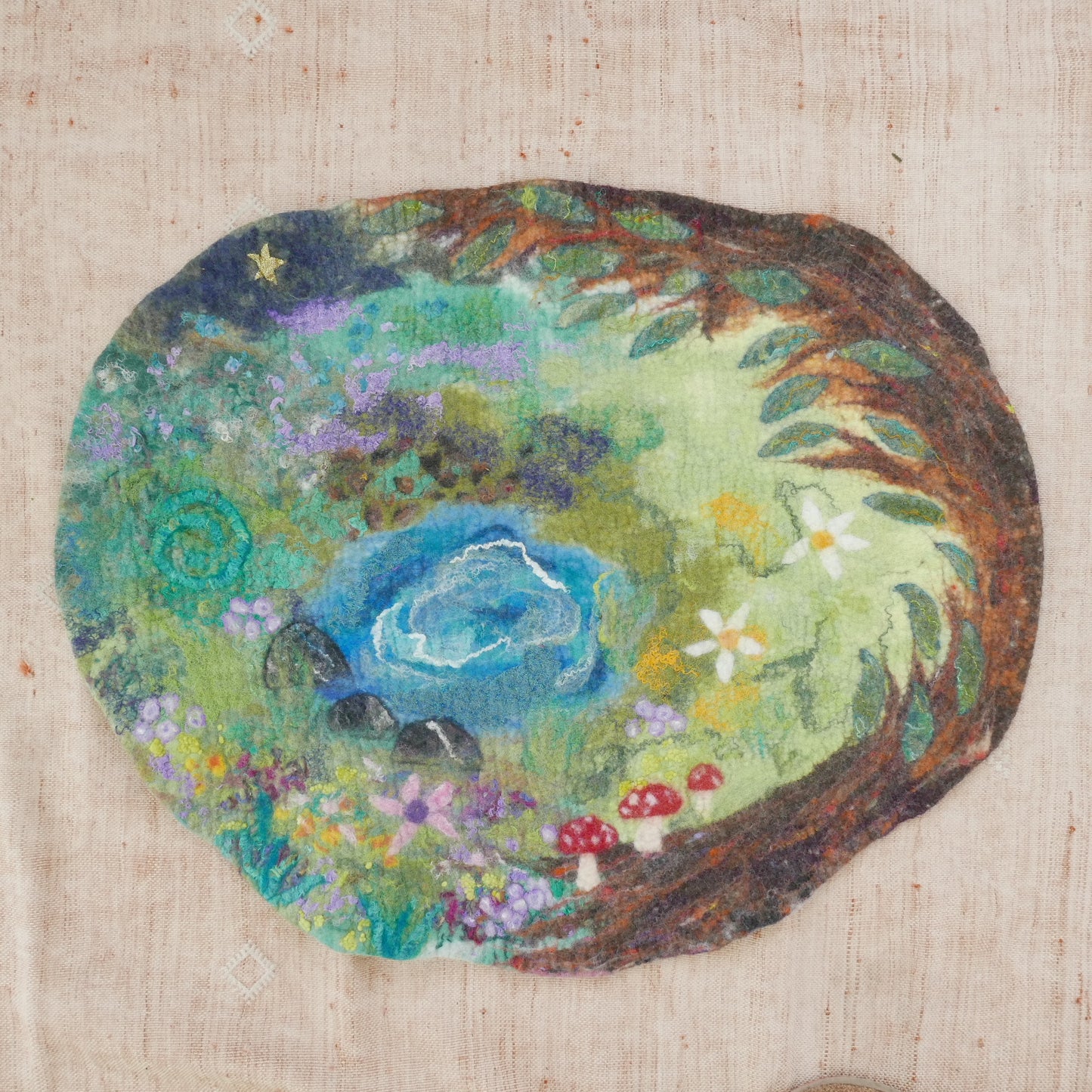 Round woven artwork with a floral design on a textured beige background