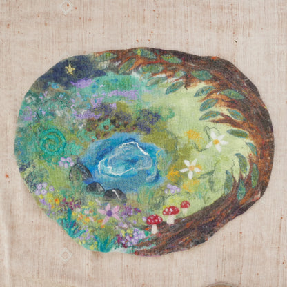 Round woven artwork with a floral design on a textured beige background