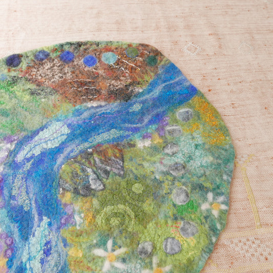 Artistic depiction of a landscape with water, plants, and flowers on a textured beige background