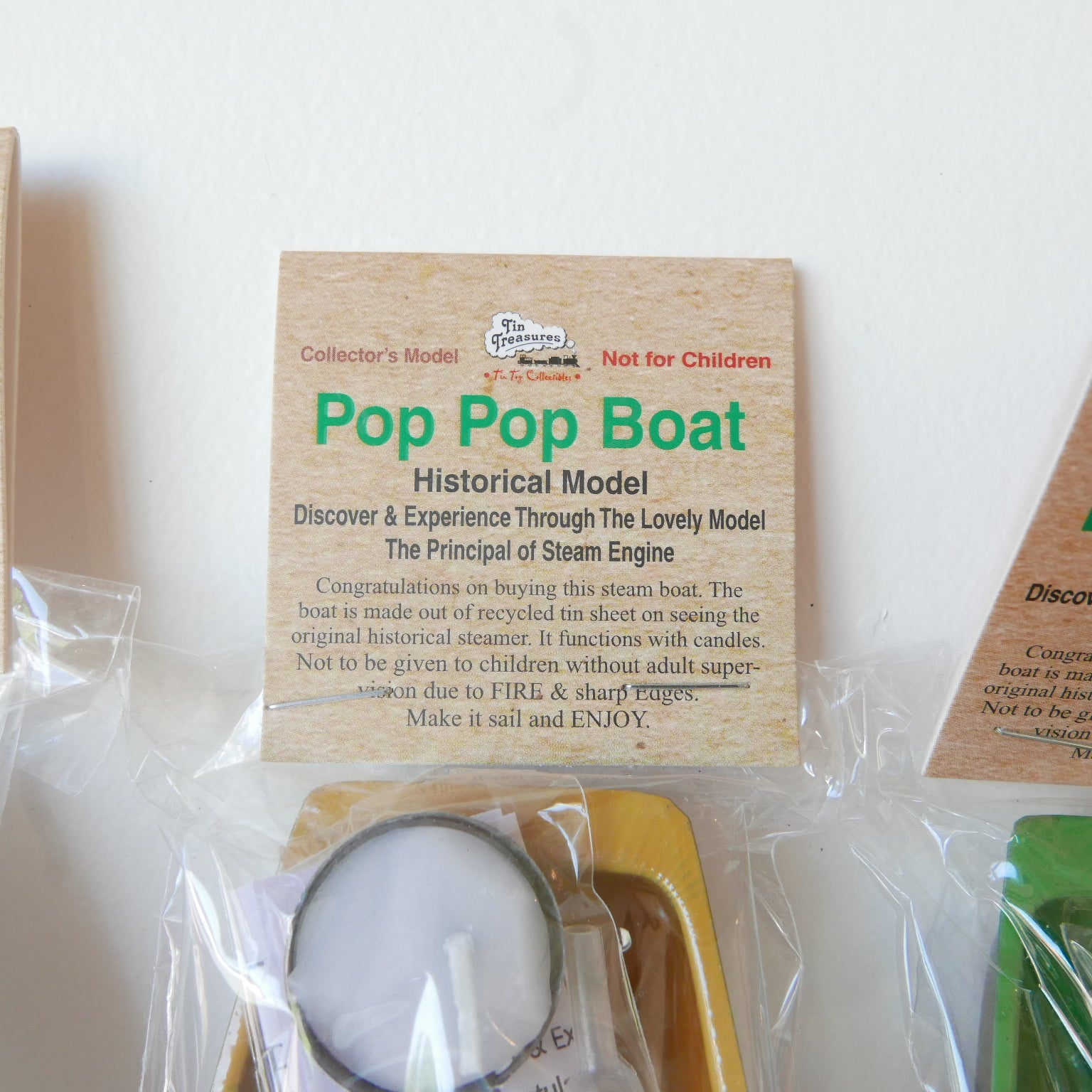 Pop Pop Boat packaging with wooden label on a white background
