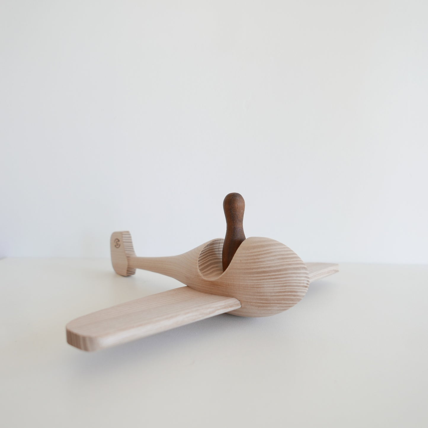 Wooden Aeroplane with a Figurine