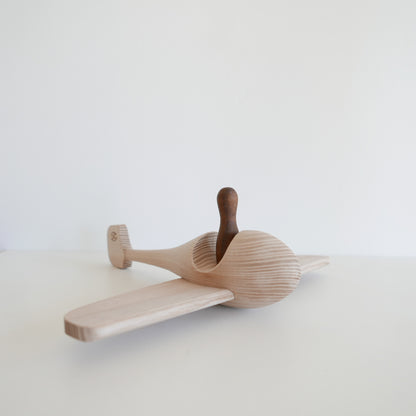 Wooden Aeroplane with a Figurine