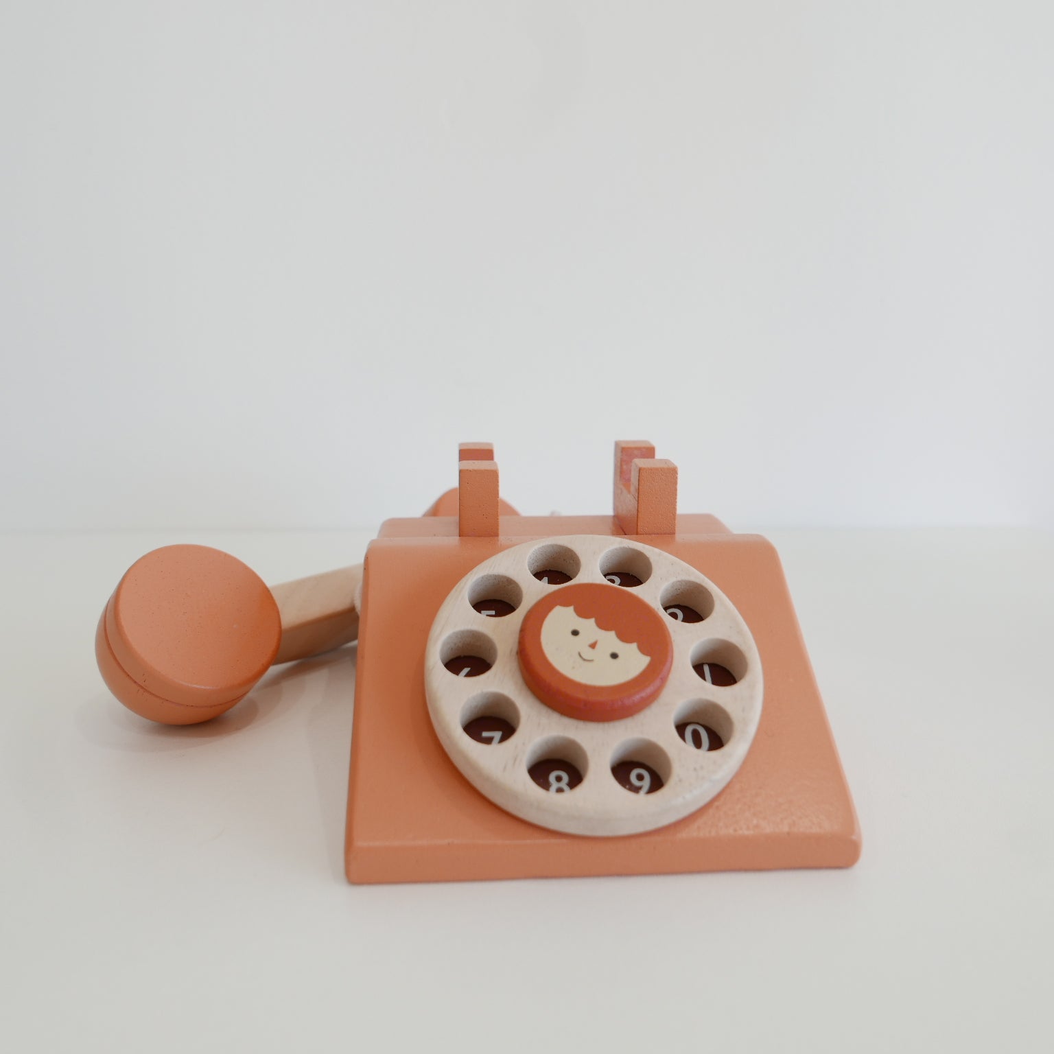 Wooden Toy telephone with a rotary dial